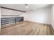 Open loft area with wood flooring, high ceiling, and great light at 5245 New Bedford Cir, Las Vegas, NV 89122