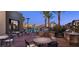 Outdoor kitchen and dining area with mountain views at 11275 Glowing Ave # 103, Las Vegas, NV 89135