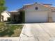 Two-story house with a two-car garage and grassy front yard at 1307 Deer Horn Ln, North Las Vegas, NV 89031