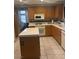 Kitchen boasts ample cabinetry and an island at 1307 Deer Horn Ln, North Las Vegas, NV 89031