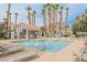 Community pool and spa with lounge chairs at 2313 Pacific Creek St, Las Vegas, NV 89117