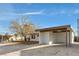 House exterior showcasing carport and landscaping at 3411 E Diana Dr, North Las Vegas, NV 89030