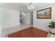 Spacious dining area with hardwood floors and chandelier at 6636 Woodsworth Ave, Las Vegas, NV 89108