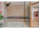 Bathroom with shower/tub combo and terracotta floor at 8480 W Ann Rd, Las Vegas, NV 89149