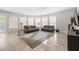 Relaxing living room with comfortable seating and large windows at 1604 Bontemps Ct, Henderson, NV 89052