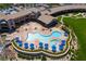 Expansive pool area with a spa and surrounding lounge chairs at 1604 Bontemps Ct, Henderson, NV 89052