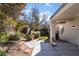 Landscaped backyard with patio and pathway at 2778 Meadow Park Ave, Henderson, NV 89052