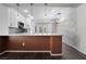 Modern kitchen with white cabinets and quartz countertops at 2778 Meadow Park Ave, Henderson, NV 89052