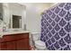 Small bathroom with toilet, sink, and shower at 2815 Donatello Manor Pl, Henderson, NV 89044