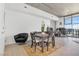 Modern dining area with seating for four and city views at 353 E Bonneville Ave # 1106, Las Vegas, NV 89101