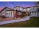 Two-story house with gray siding, brick accents and a landscaped yard at 3531 W Arby Ave, Las Vegas, NV 89118