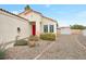 House exterior featuring red door and gravel landscaping at 789 Salt Flats Cir, Henderson, NV 89011