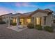 Exterior of home with a covered patio, grill, and dining area at 10421 Linfield Pl, Las Vegas, NV 89134