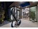 Elegant entryway with modern sculpture and glass doors at 1100 Spirit Rock Dr, Henderson, NV 89012