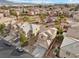 Aerial view of house and surrounding neighborhood at 205 Gracious Crest Ave, North Las Vegas, NV 89032