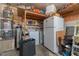 Storage room with shelving, refrigerator, and additional space at 2302 El Molino Cir, Las Vegas, NV 89108