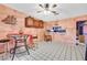 Round table and chairs in a small dining area with a tiled floor and built-in cabinets at 501 Sam Jonas Dr, Las Vegas, NV 89145