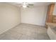 Dining area with tile floors and ceiling fan at 5062 Village Dr, Las Vegas, NV 89142