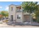 Two-story house with balcony, attached garage, and landscaping at 6623 Topley Pike Ave, Las Vegas, NV 89139