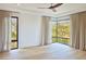 Guest bedroom with hardwood floors and views of the desert landscape at 10911 Discovery Peak Ct, Las Vegas, NV 89135