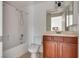 Bathroom with toilet, shower, and wood vanity at 2109 Alyssa Jade Dr, Henderson, NV 89052