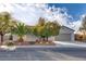 Single-story home with attached garage and desert landscaping at 2109 Alyssa Jade Dr, Henderson, NV 89052