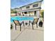 Resort-style pool with patio furniture and view of the home at 3047 Palace Gate Ct, Las Vegas, NV 89117