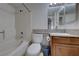 Clean bathroom with a tub, toilet and granite vanity at 5114 S Jones Blvd # 203, Las Vegas, NV 89118