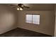 Bedroom with carpet flooring and ceiling fan at 5909 Mount Auburn St, Las Vegas, NV 89130