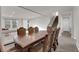 Formal dining room with ornate table and chairs, near staircase at 8256 Dover Canyon Ct, Las Vegas, NV 89139