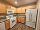 Well-equipped kitchen featuring granite countertops and modern appliances at 8725 W Flamingo Rd # 241, Las Vegas, NV 89147