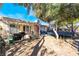 Spacious backyard featuring a pergola, grill, and trampoline at 170 Lovett Rd, Henderson, NV 89015