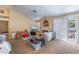 Living room with fireplace and access to backyard at 170 Lovett Rd, Henderson, NV 89015