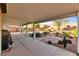 Flagstone patio and covered patio with built-in grill at 2234 Dillons Cove Dr, Laughlin, NV 89029