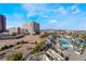 Relaxing pool area with city views and palm trees at 2700 Las Vegas Blvd # 610, Las Vegas, NV 89109