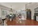 Open dining room with hardwood floors and chandelier at 2721 Crystal Beach Dr, Las Vegas, NV 89128