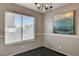 Bright dining area with large window and chandelier at 352 Dockside Ct, Las Vegas, NV 89145