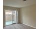 Bright bedroom with sliding door to patio at 4017 Foxgrove Dr, Las Vegas, NV 89147