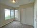 Bedroom with large window and double closet at 4017 Foxgrove Dr, Las Vegas, NV 89147