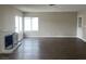 Living room with fireplace and laminate wood floor at 4017 Foxgrove Dr, Las Vegas, NV 89147