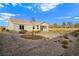 Spacious backyard with gravel and desert landscaping at 5471 Lincolnwood Ct, Pahrump, NV 89061