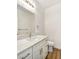 Clean bathroom with white vanity, quartz countertop and a toilet at 5471 Lincolnwood Ct, Pahrump, NV 89061