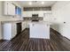 Well-appointed kitchen featuring white cabinets and tile backsplash at 5988 Atmore Ct, Las Vegas, NV 89110