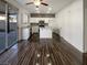 Modern kitchen with white cabinets and an island at 5988 Atmore Ct, Las Vegas, NV 89110