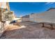 Backyard with gravel, a patio table and potential for development at 6439 Wadsworth Ct, Las Vegas, NV 89156