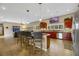 Modern kitchen with stainless steel appliances and an island at 647 Foxhall Rd, Henderson, NV 89002