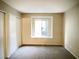 Bright bedroom with a large window and built-in shelving at 7200 Pirates Cove Rd # 1088, Las Vegas, NV 89145