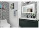 Stylish bathroom with black and white geometric tile and a modern vanity at 8401 Dunphy Ct, Las Vegas, NV 89145