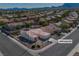 Aerial view of the home, landscaping, driveway, and street at 10301 Long Leaf Pl, Las Vegas, NV 89134