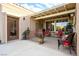 Inviting patio with covered seating area, perfect for outdoor relaxation at 10600 Cedar Creek Ave, Las Vegas, NV 89134